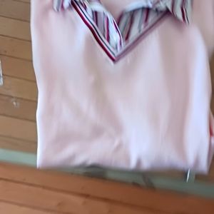 Women pull on sweater